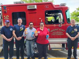 MAVFC VP CJ Hamilton, DFEMS Chris Howell, Weis employees Maurica Fornataro, Eddy Castellon, DFEMS Lt. Mike Moser
